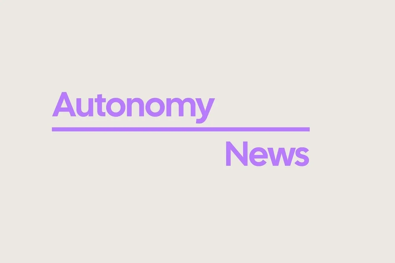 Purple text that says "Autonomy News," on a gray background.